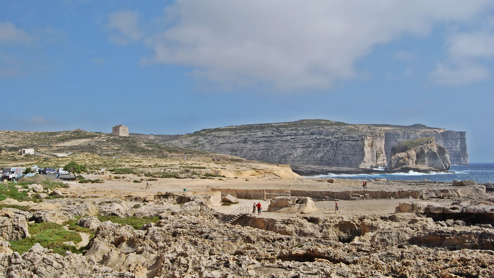 The rugged Dwejra coastline on Gozo with open sea and limestone cliffs