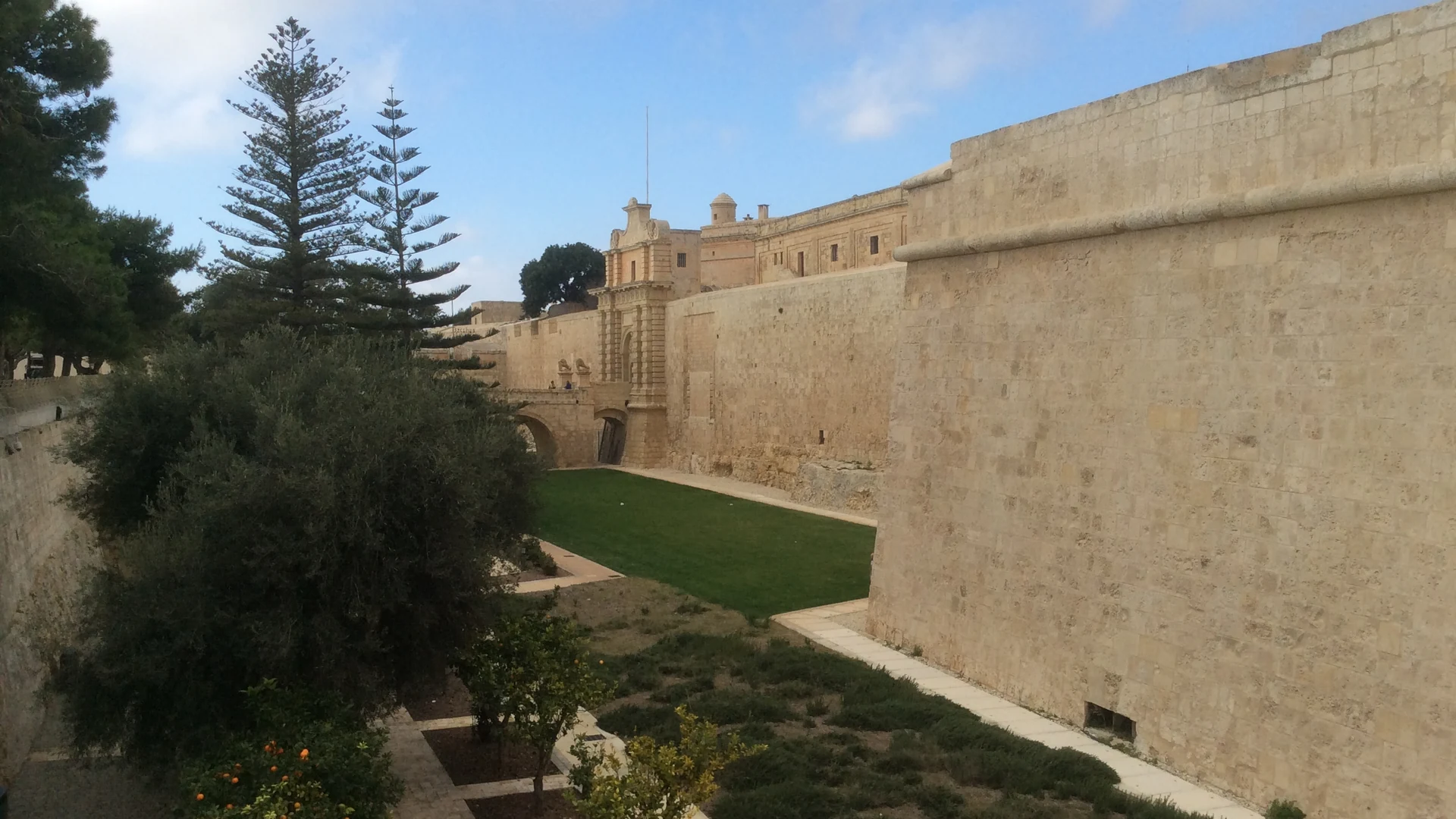 The honey-coloured fortified walls of Mdina, Malta's silent city